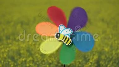 油菜田和蜜蜂图片风车玩具